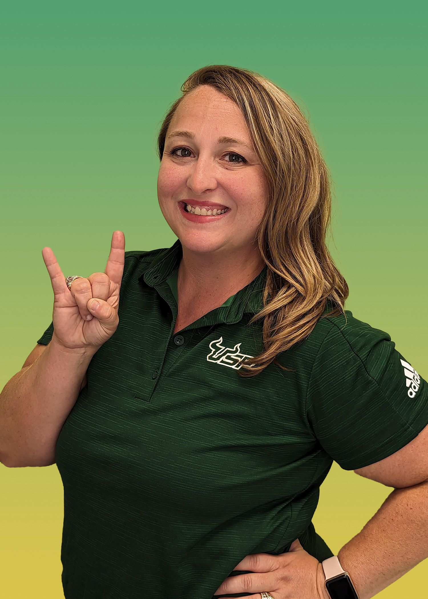 Portrait of Tarin Haydt in Green USF Polo.