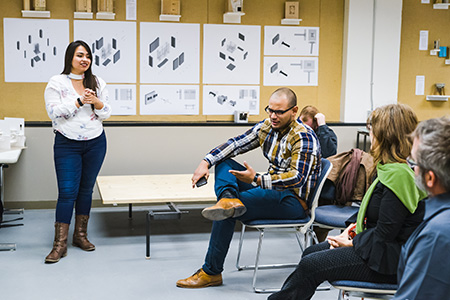 USF Architecture Student presents her master's thesis project during a midterm review panel.