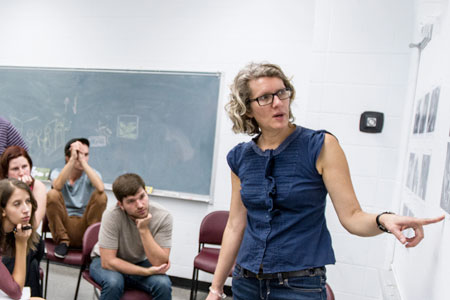 Associate Professor Wendy Babcox teaches art students about photography.