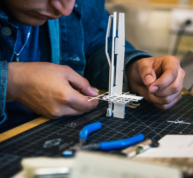 A student builds a model.