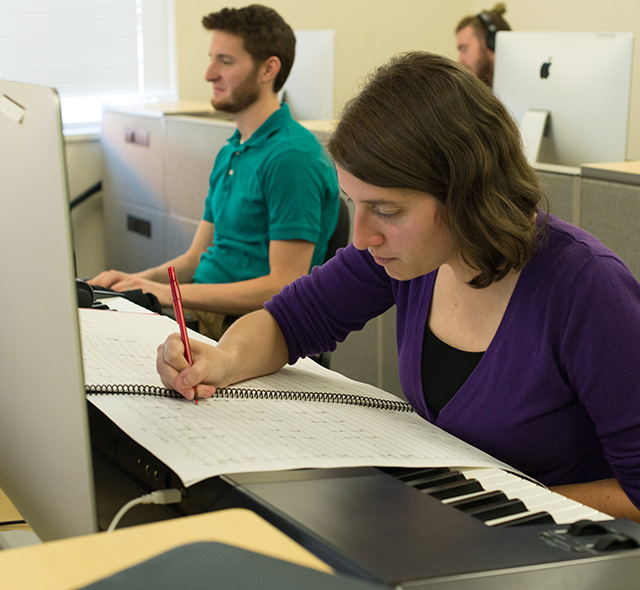 Student composing new music in the USF Composition Lab