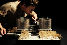 American Institute of Architects, Tampa Bay Chapter - Photo of student preparing a maquette for presentation at the USF School of Architecture & Community Design.