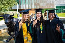 USF Graduation Application - Photo of graduating Theatre & Dance students taking a selfie while waiting for the commencement ceremony to begin