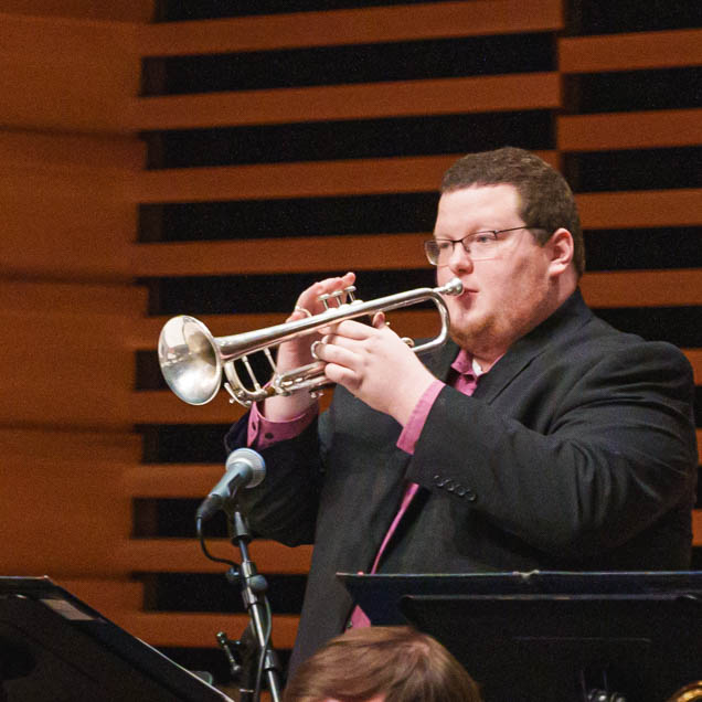 Performer playing trumpet