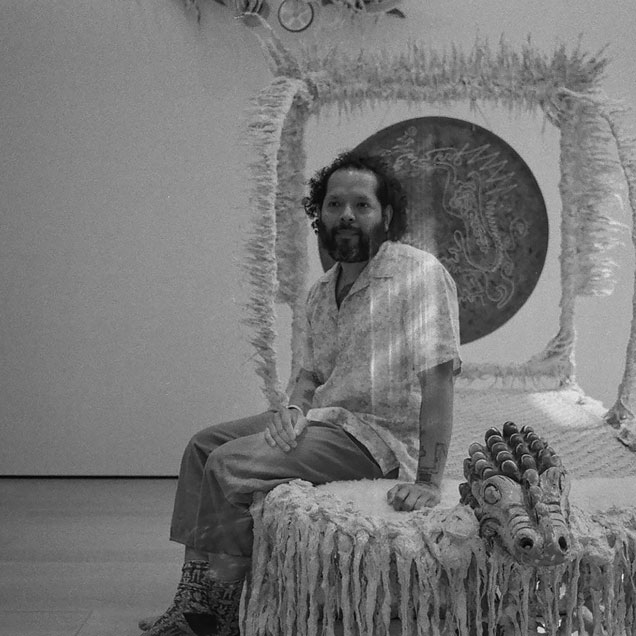 Black and white portrait of a man sitting