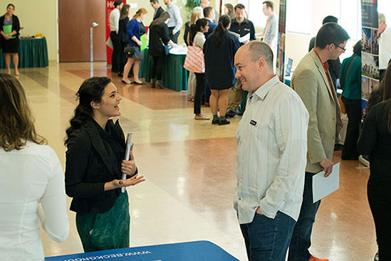 Student and job recruiter having a conversation at the Architecture Career Expo