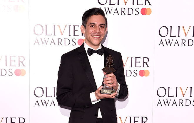 Matthew Lopez holds Olivier Awards at the 2019 Olivier Awards Ceremony in London