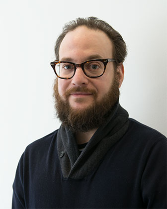 photo portrait of Jason Lazarus against a white background