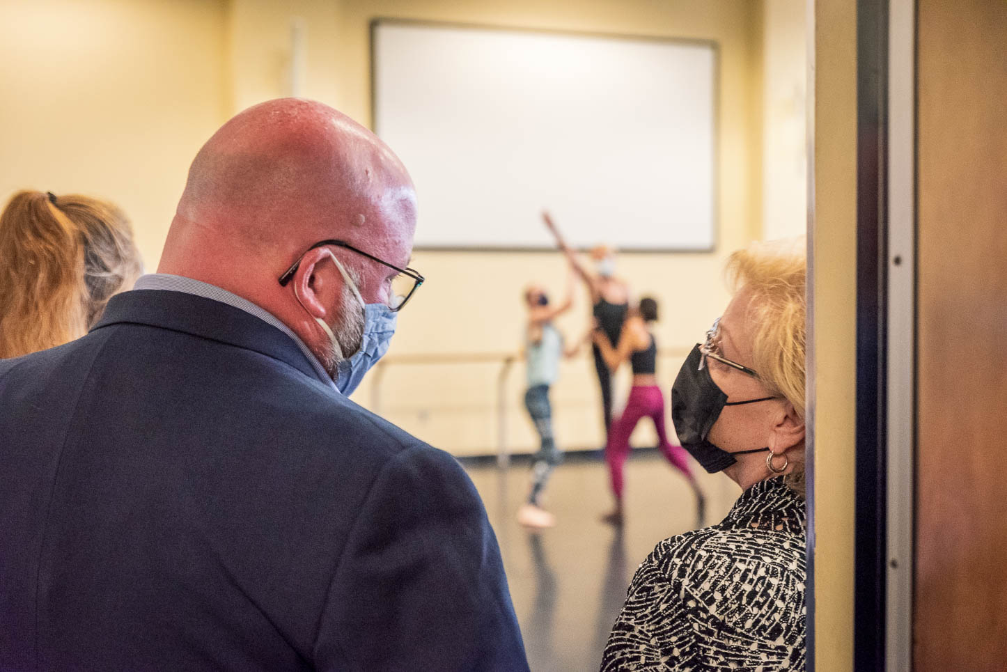 Dean Chris Garvin and President Rhea Law look on as a dance class practices in the USF School of Theatre & Dance.