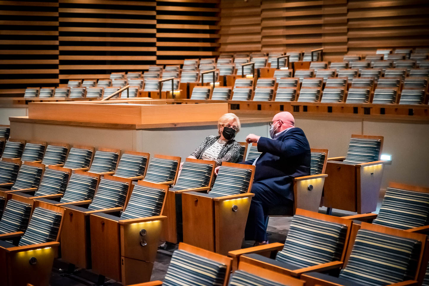 President Rhea Law and Dean Chris Garvin sit in the USF Concert Hall.