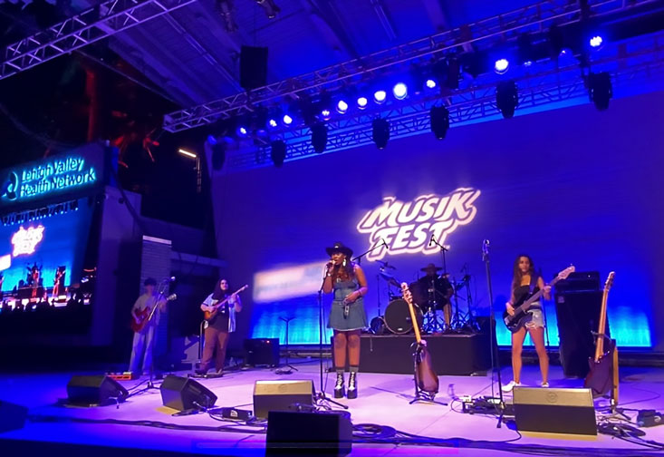 Holly Drive Collective performs on stage at Musikfest.