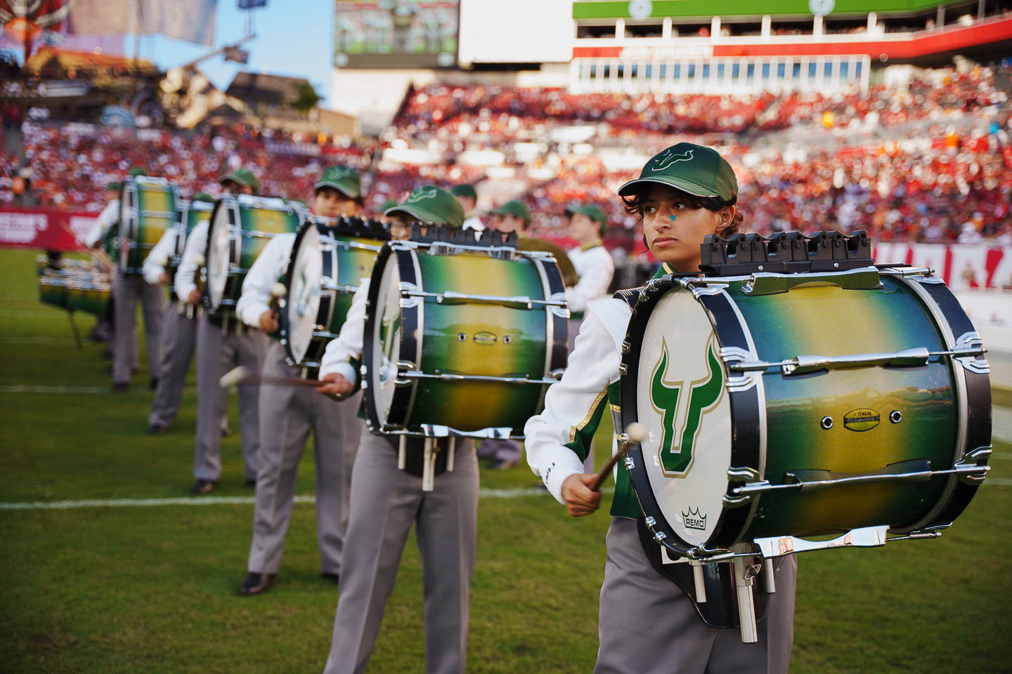 Percussionists perform on the field.