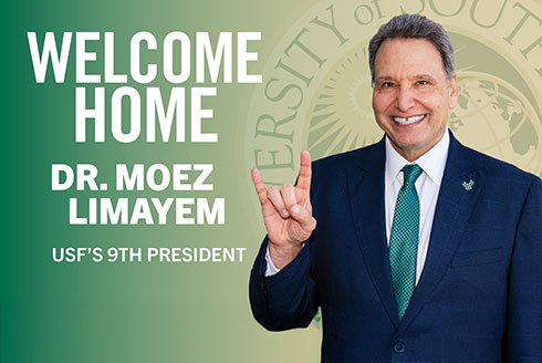 Dr. Moez Limayem smiling and giving the USF