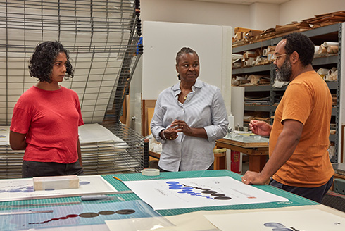 Dr. Antoinette Jackson (center) discusses the Printing Black America project with urbanist Shraddha Ramani (left) and artist William Villalongo (right). Photo by Will Lytch.