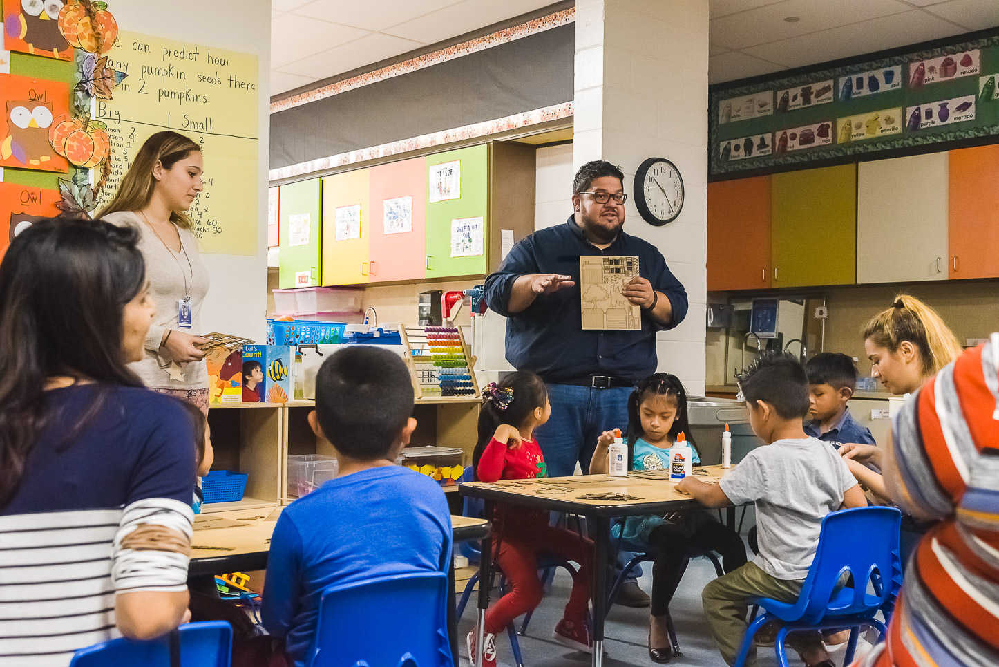 Josue Robles explains the kit of parts to the class.