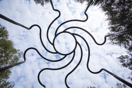 looking up to the sky through a spiral shape