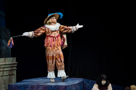 A student performing as Pompey in the play "Measure for Measure."