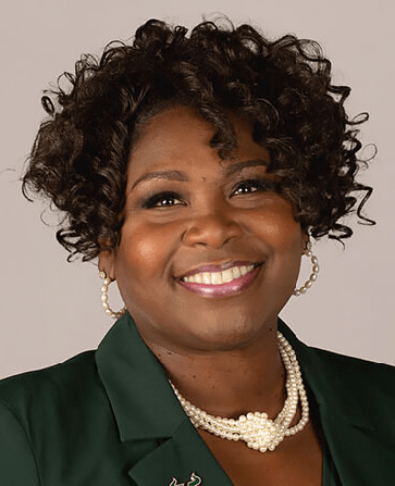 Sylvia Thomas wearing a green blazer