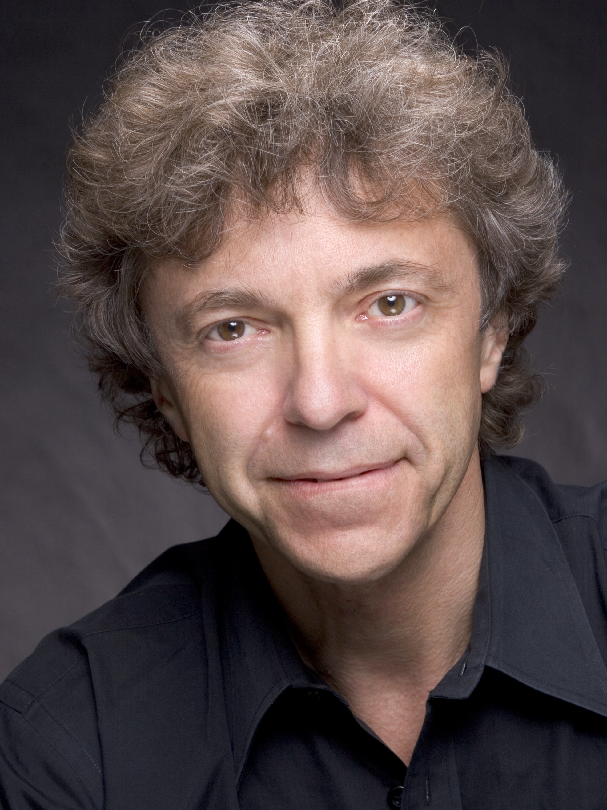 Pascal Rogé wearing collared shirt.