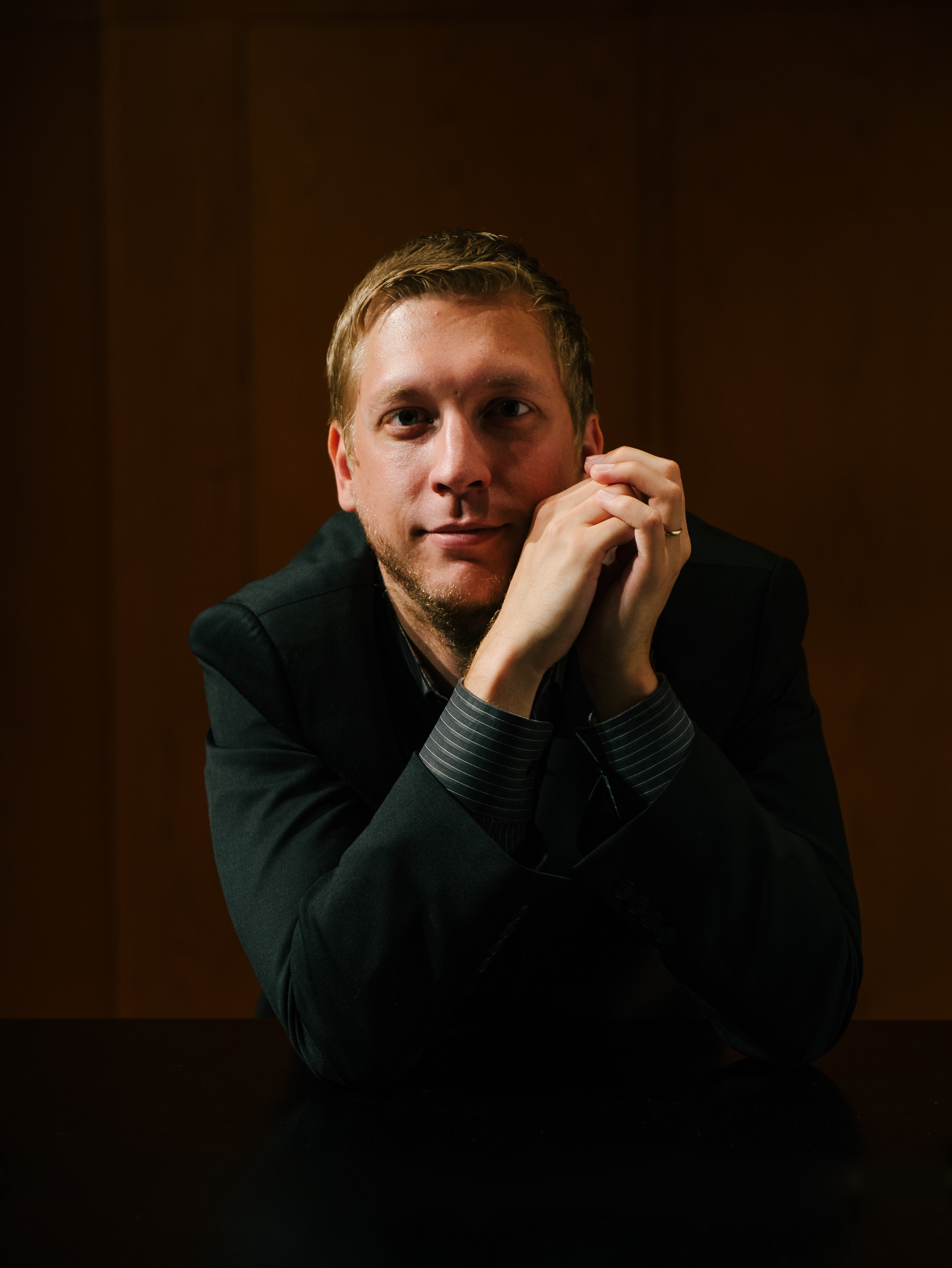 Stijn De Cock with hands clasped.