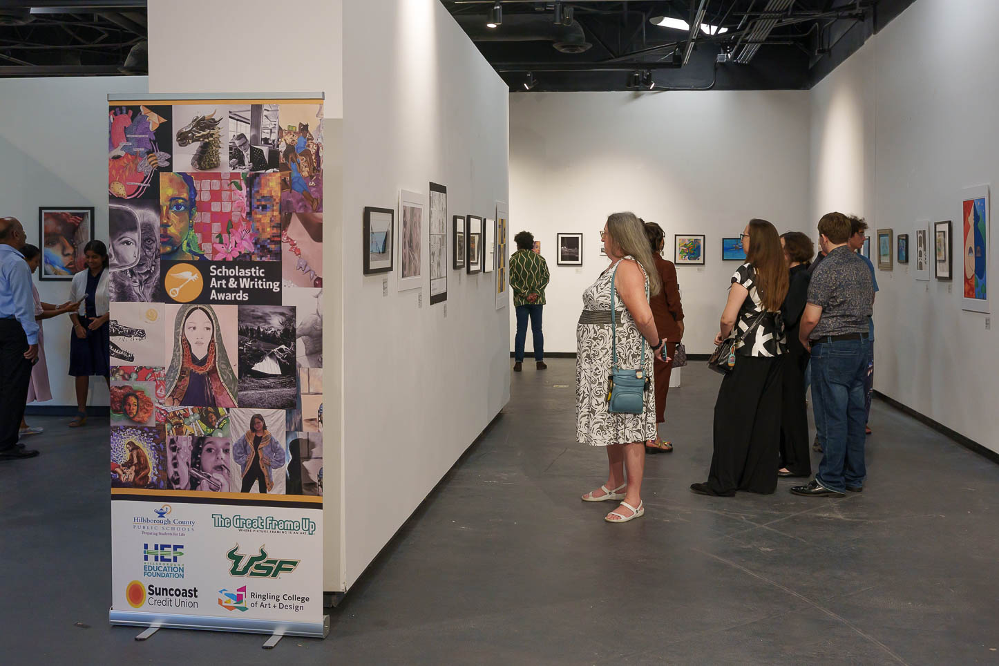 Students and parents view judged works in the Carolyn M. Wilson Gallery