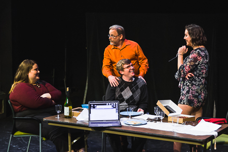 William Leavengood teaching students playwriting in a live reading of their works.