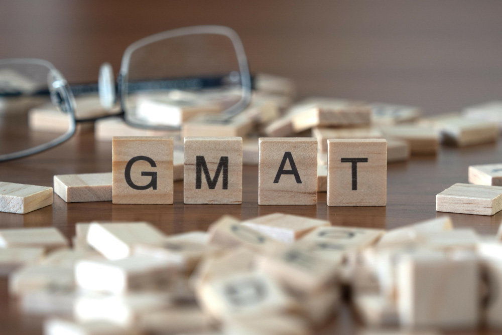 GMAT spelled with scrabble bricks