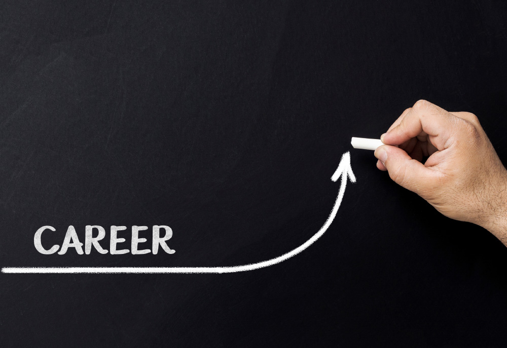 hand drawing with chalk a upward line labeled career