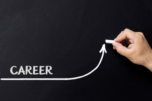 hand drawing with chalk a upward line labeled career