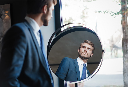 Person looking in mirror