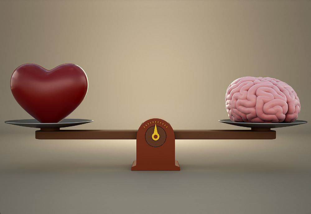 scales showing balance between heart and brain