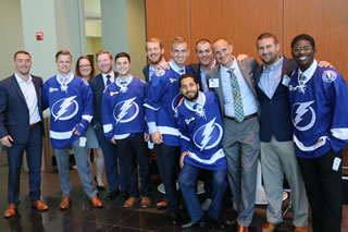 competitors in Lightning jerseys