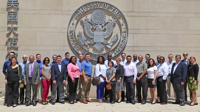 Photo of a large group of MBA students at the US Embassy in China.
