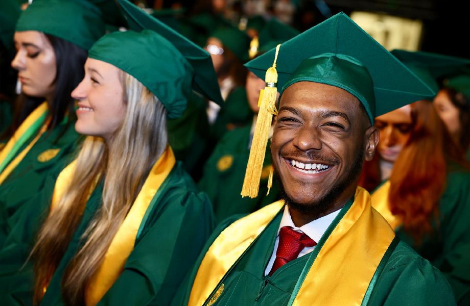 Graduates smiling