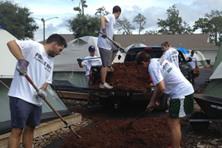 Students spreading mulch