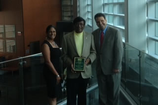 Distinguished Speaker - Dr. Kiran Patel with daughter and Dean Limayem