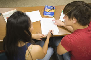 Students working on a paper