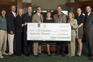 USF President Judy Genshaft, faculty and students from the Muma College of Business, USF athletics officials, and members of the USF golf program gathered at the Lee Roy Selmon Athletics Center on Wednesday to graciously accept a $75,000 gift from Copperhead Charities.