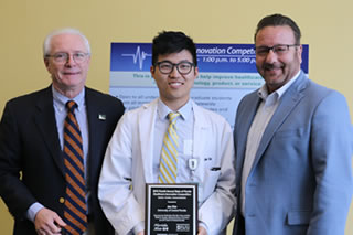Michael Fountain and David Pizzo with competition winner Jae Kim