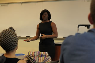Ashley Washington speaks to a class full of Corporate Mentor students.