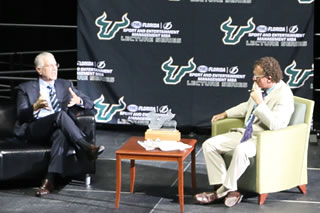 Tod Leiweke chatting on stage with Abe MadKour