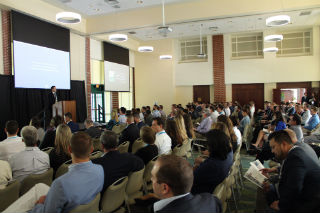 Conference Speaker and Crowd