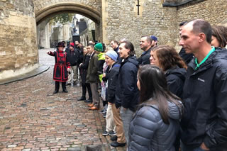 Students listening to tour guide