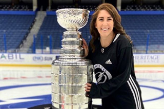 Crystal Ortiz posing with Stanley Cup
