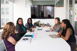 Women sitting in conference room