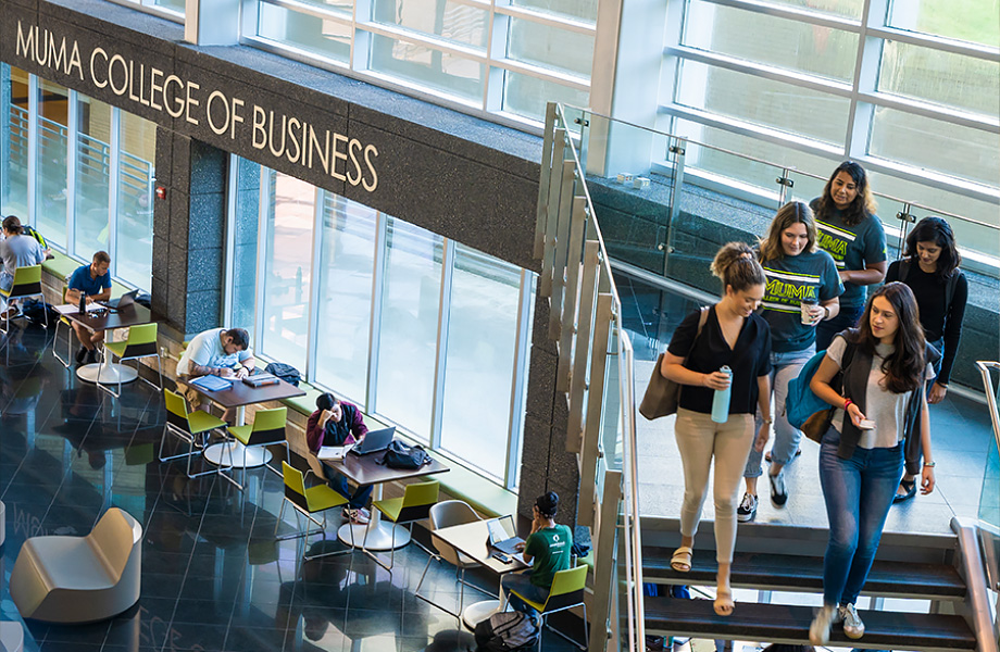 Students in atrium of business building