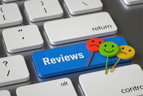 Keyboard with reviews button. Photo (c) abluecup - Getty Images