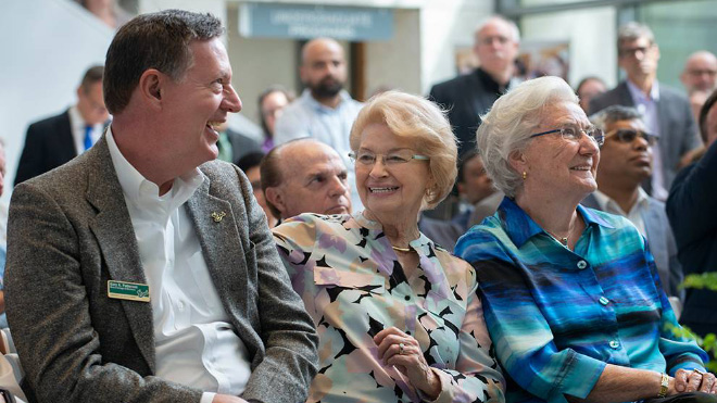Gary Patterson, left, sits with philanthropists Ellen Cotton and Kate Tiedemann at the couple's $14 million fintech gift announcement.