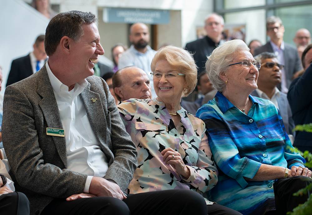 Gary Patterson sits with Ellen Cotton and Kate Tiedemann at a recent $14 million gift announcement