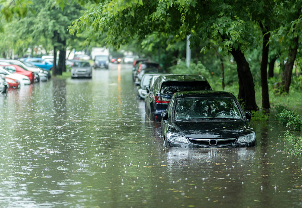 image of flooded street with cars